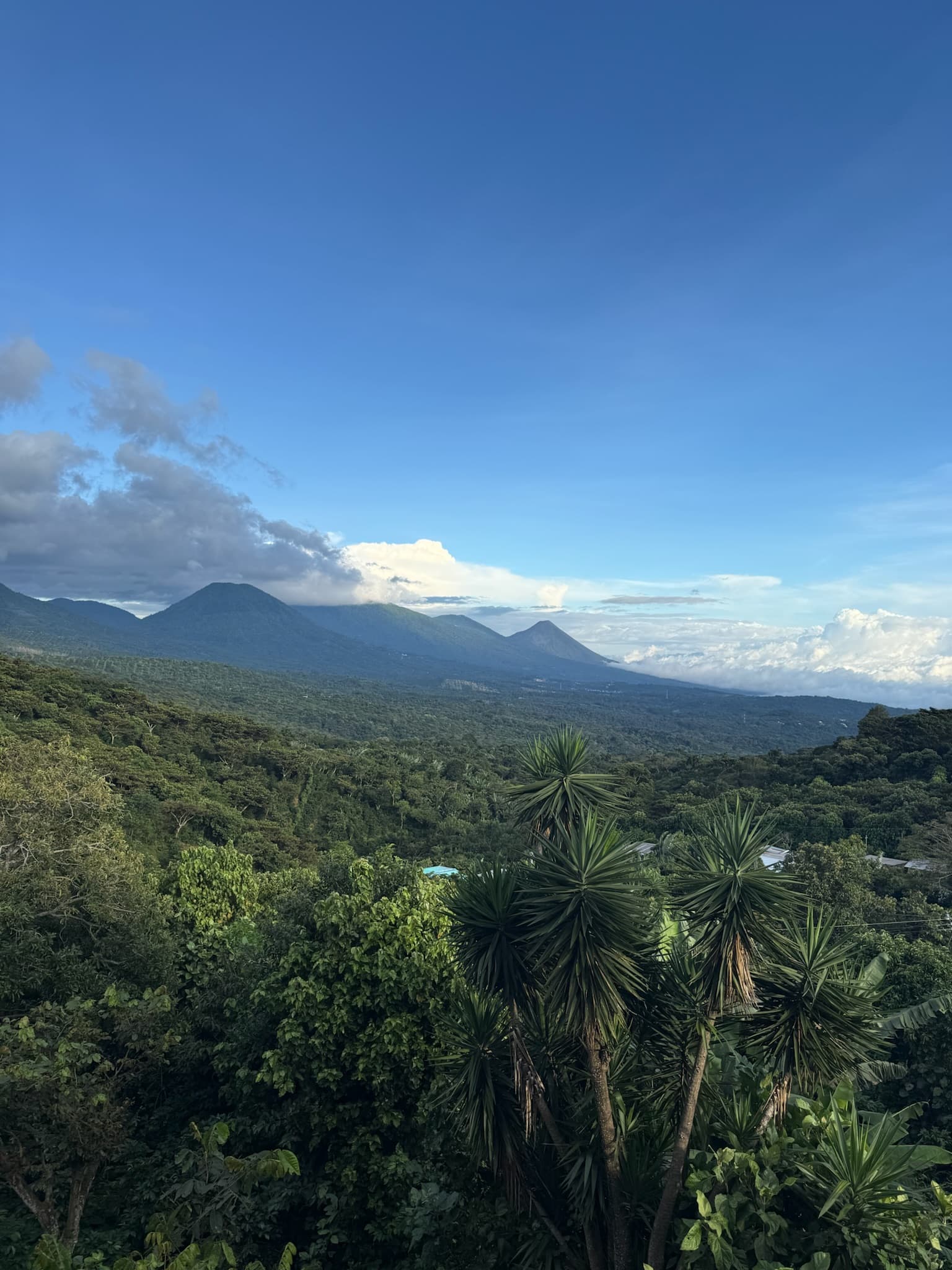 The Apaneca volcanic chain viewed across green hills
