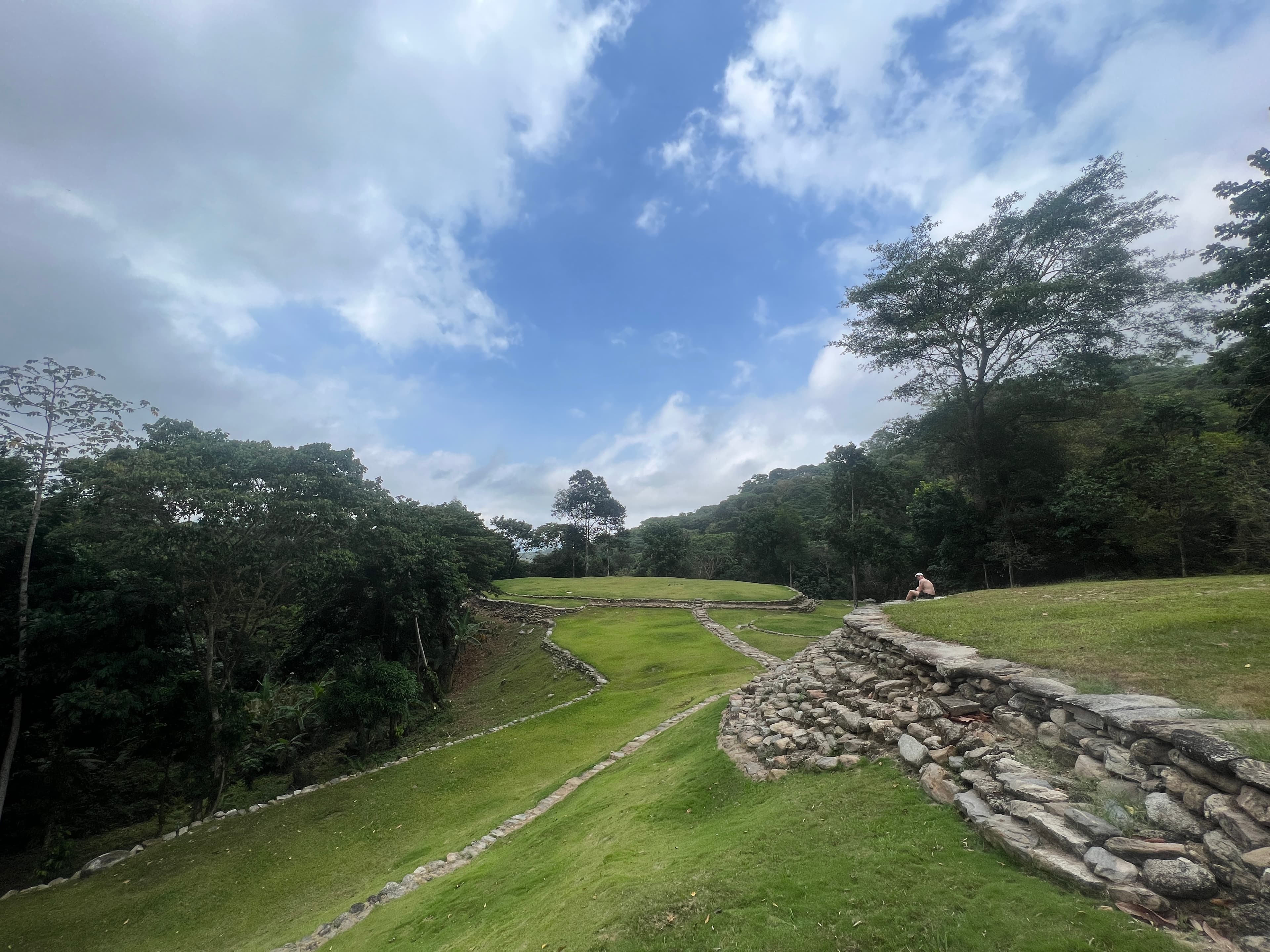 Stone ruins under a wide Colombian sky